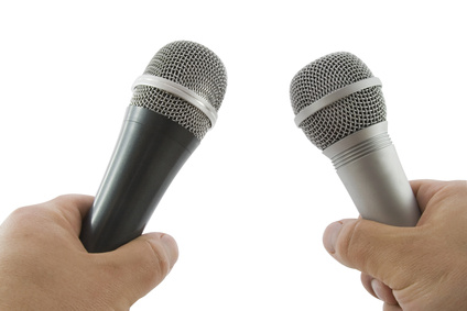 Hand with wireless microphone  